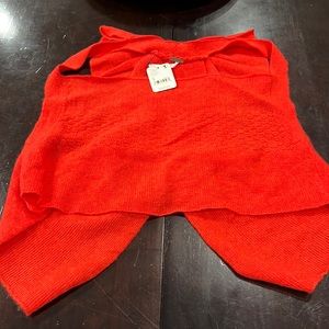 Cashmere tank top. Bow tie in the back little crop in front. Never worn.